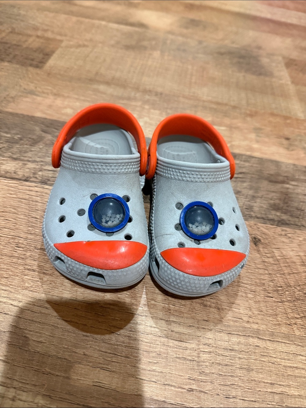 Kids Light Gray and Orange Slip-On Crocs - Size 7